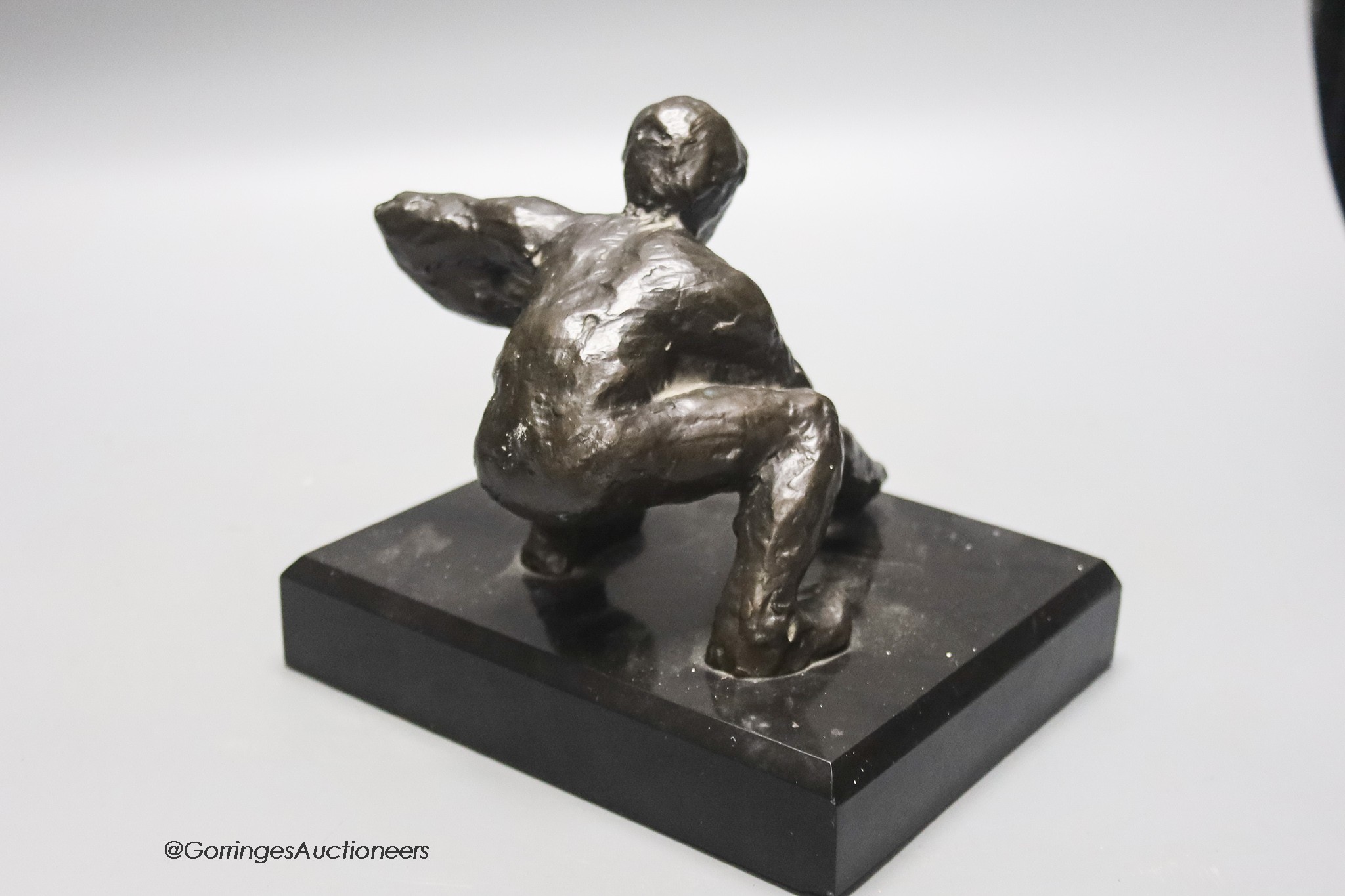 Victor Salmones. An abstract bronze of a crouching male, limited edition 4/10, height 16cm